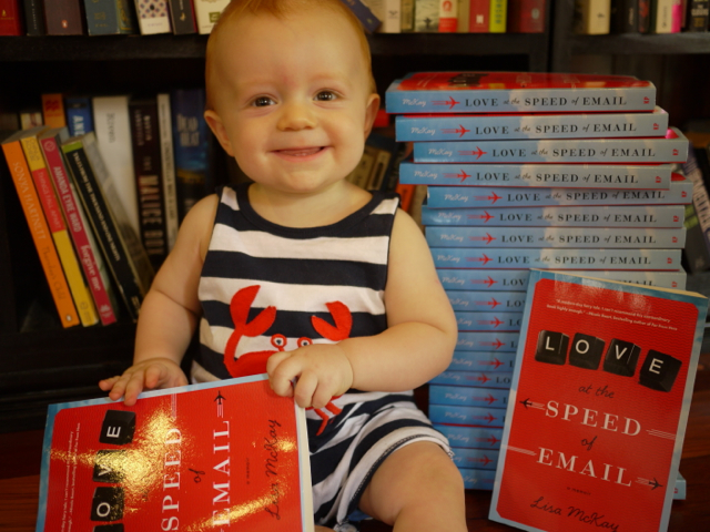 Dom and stack of books 2